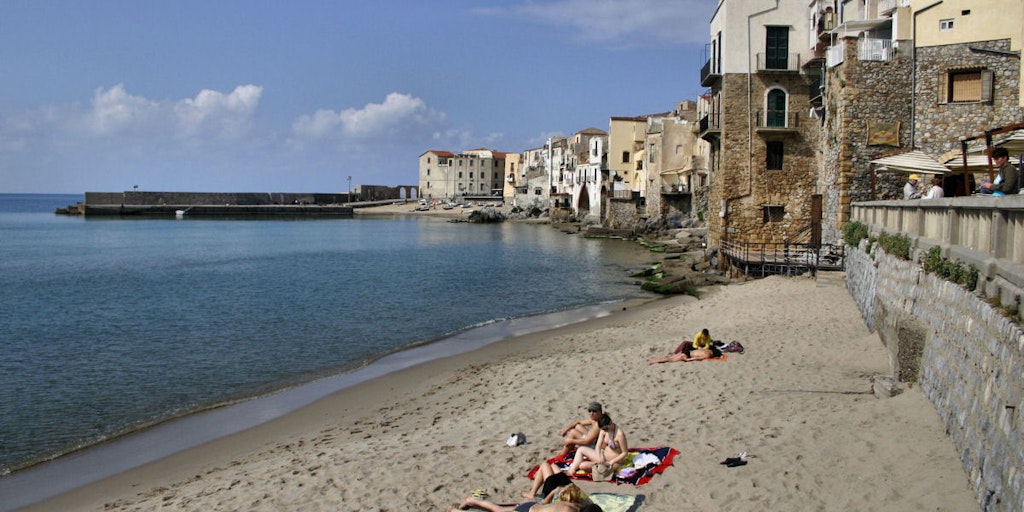 The beach with views towards the old town and harbour