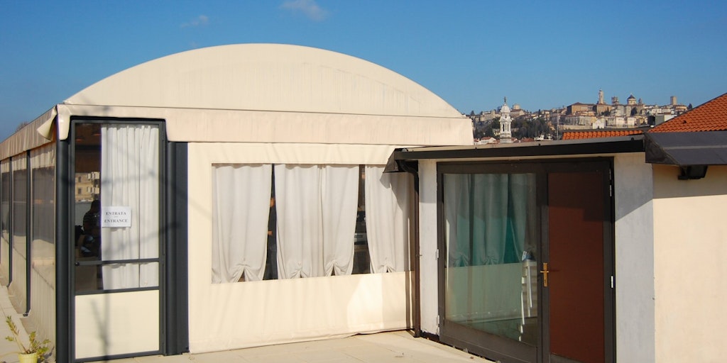 The breakfast room is located on the roof terrace
