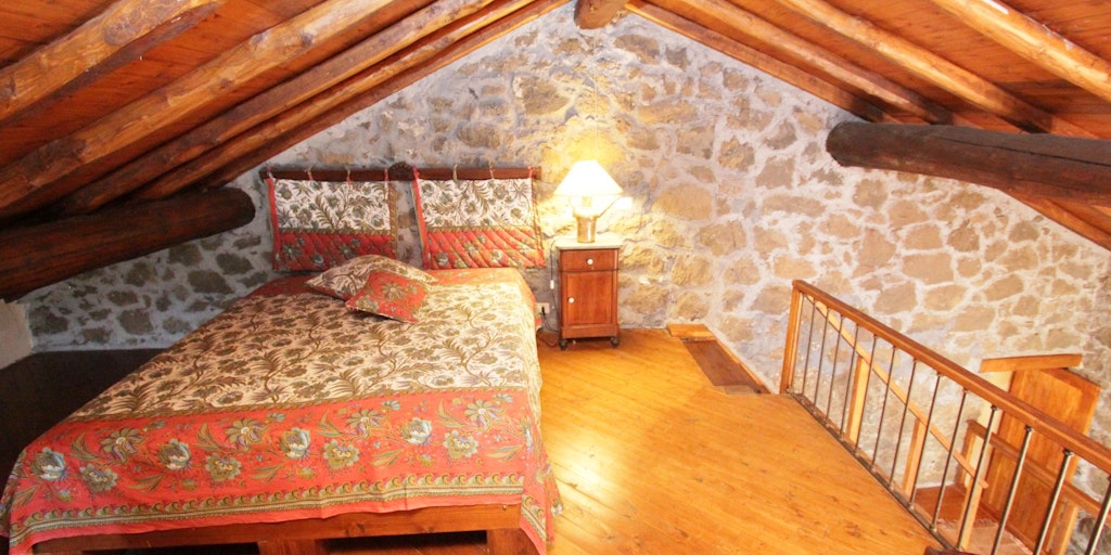 Double bed in the open loft
