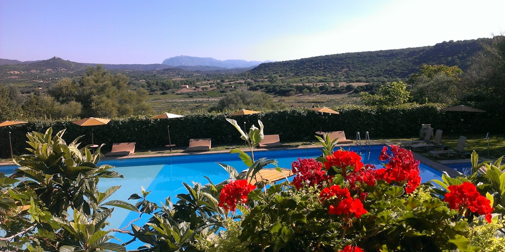 <p>The view from the restaurant towards the pool</p>
